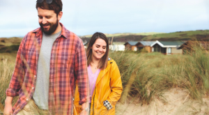 Man and woman walking in fields